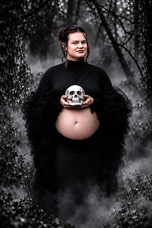 Gothic Maternity Portrait in Misty Woods