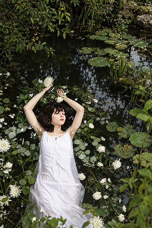 Dreamy Water Nymph in a Wild Pond
